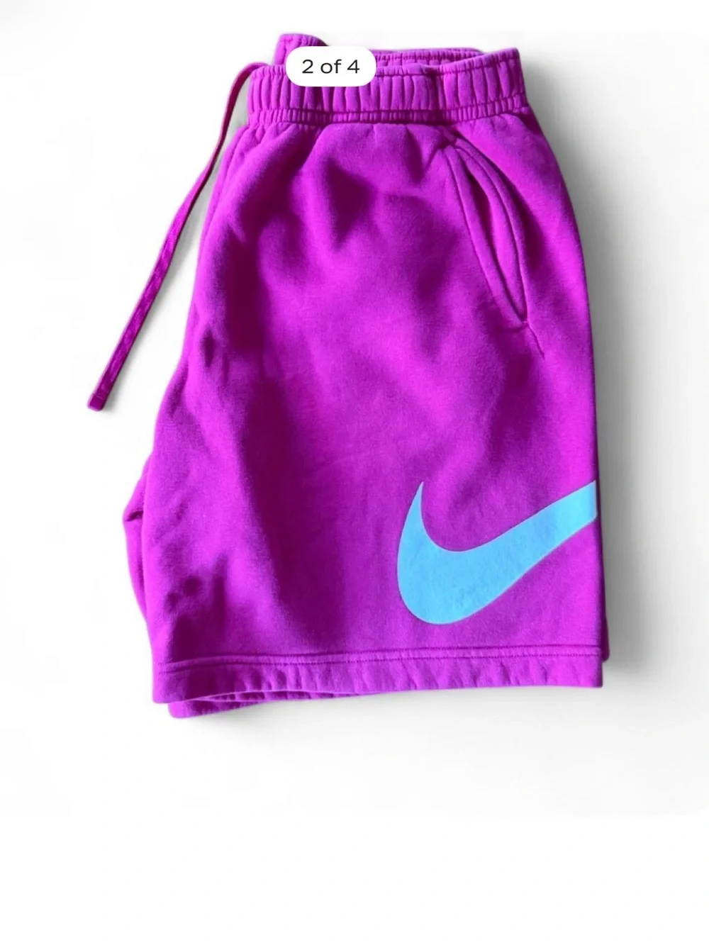 Nike men’s bright pink sweatshorts w/white Swoosh, back pocket, 2 side pockets